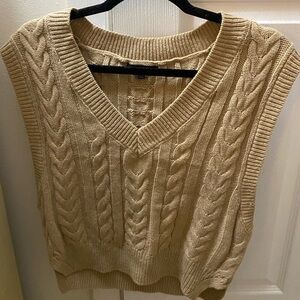Cropped tan sweater vest